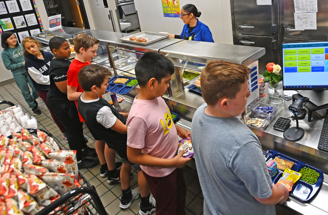 CHildren getting lunch in a cafeteria
